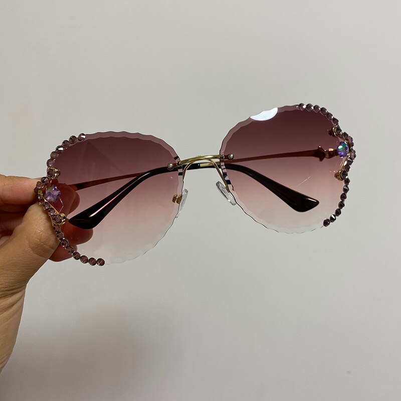 Nowa luksusowa marka projekt moda Rimless Pilot okulary przeciwsłoneczne kobiety w stylu Vintage diament gradientu fala rama okulary przeciwsłoneczne dla kobiet UV400