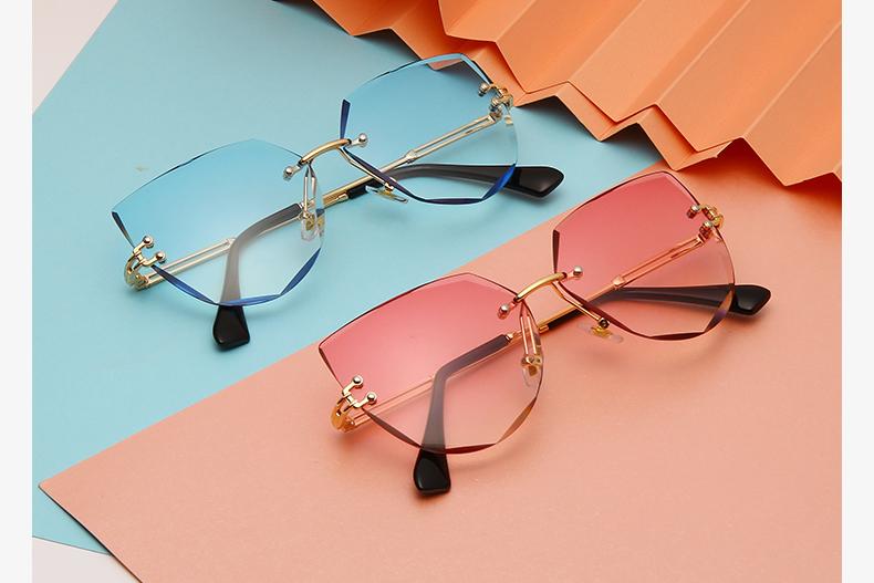Bez oprawek okulary przeciwsłoneczne Cat Eye luksusowa marka projekt kobiety metalowe okulary przeciwsłoneczne moda pani odcienie UV400 okulary óculos gafas de sol